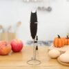 He312913877d641c9b65c136418e9b24ag.jpg Compact 2-in-1 Handheld Milk Frother Egg Whisk Portable Battery-Powered Mini Blender With Stainless Steel Stand for Coffee